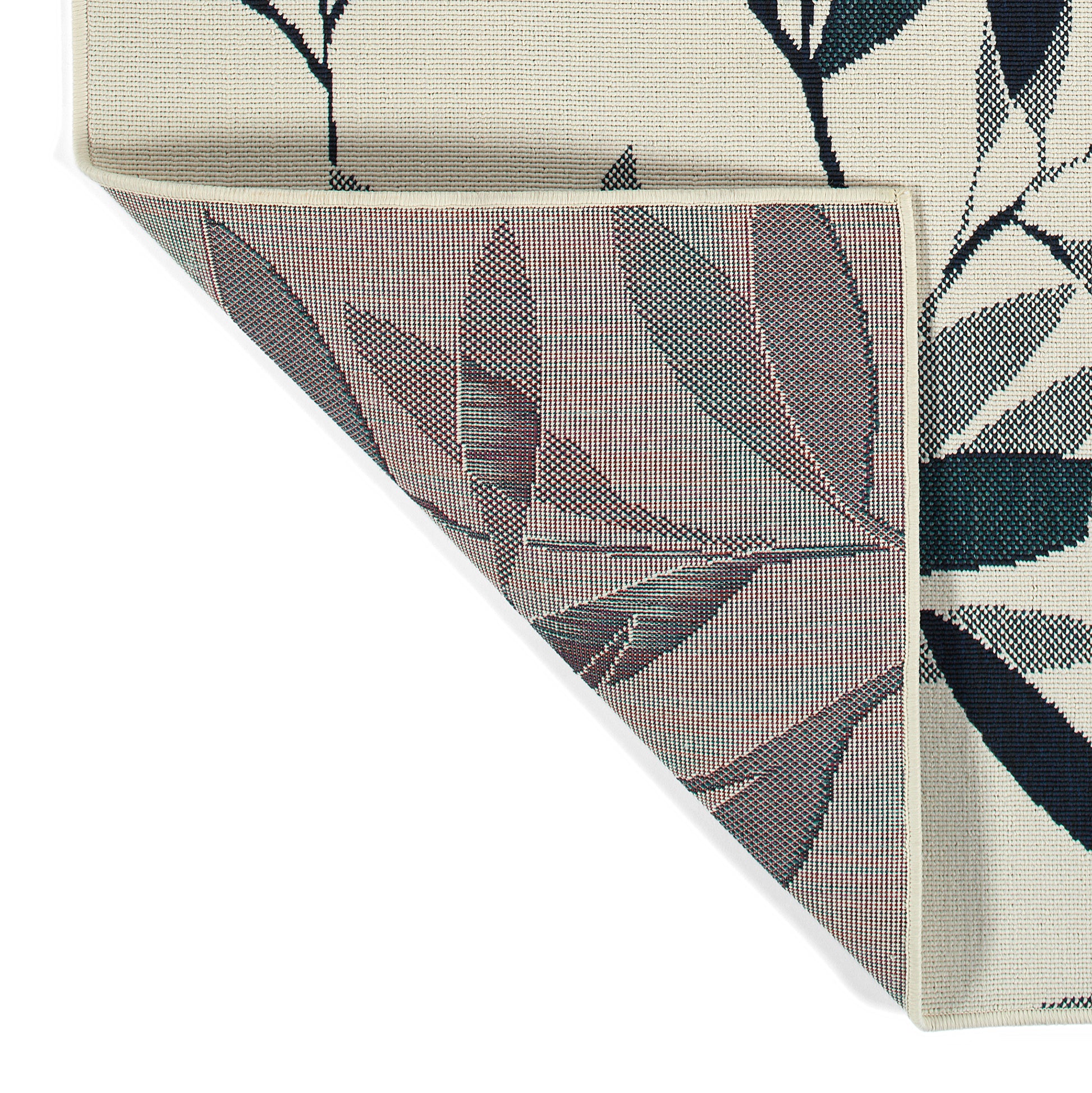 Cream area rug with dark teal leaf pattern machine woven