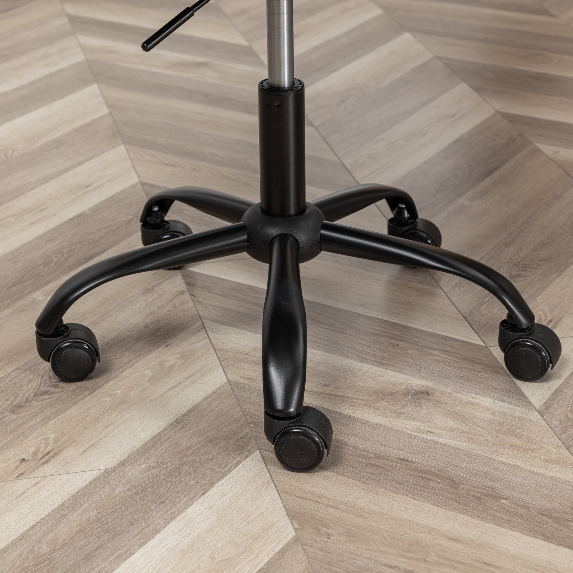 Black fivestar office chair base with dualwheel casters offering smooth mobility