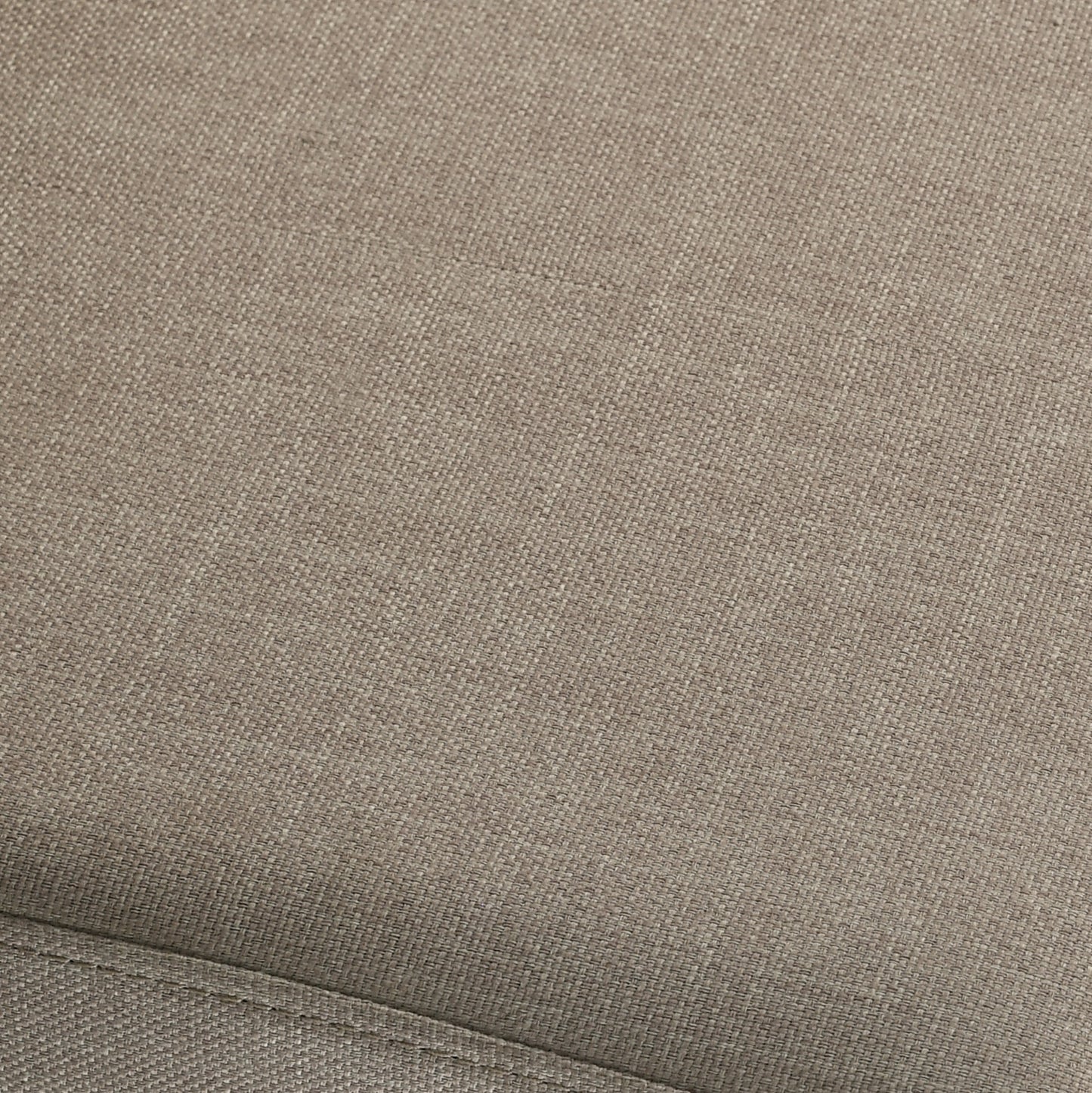 Closeup of textured taupe woven upholstery fabric