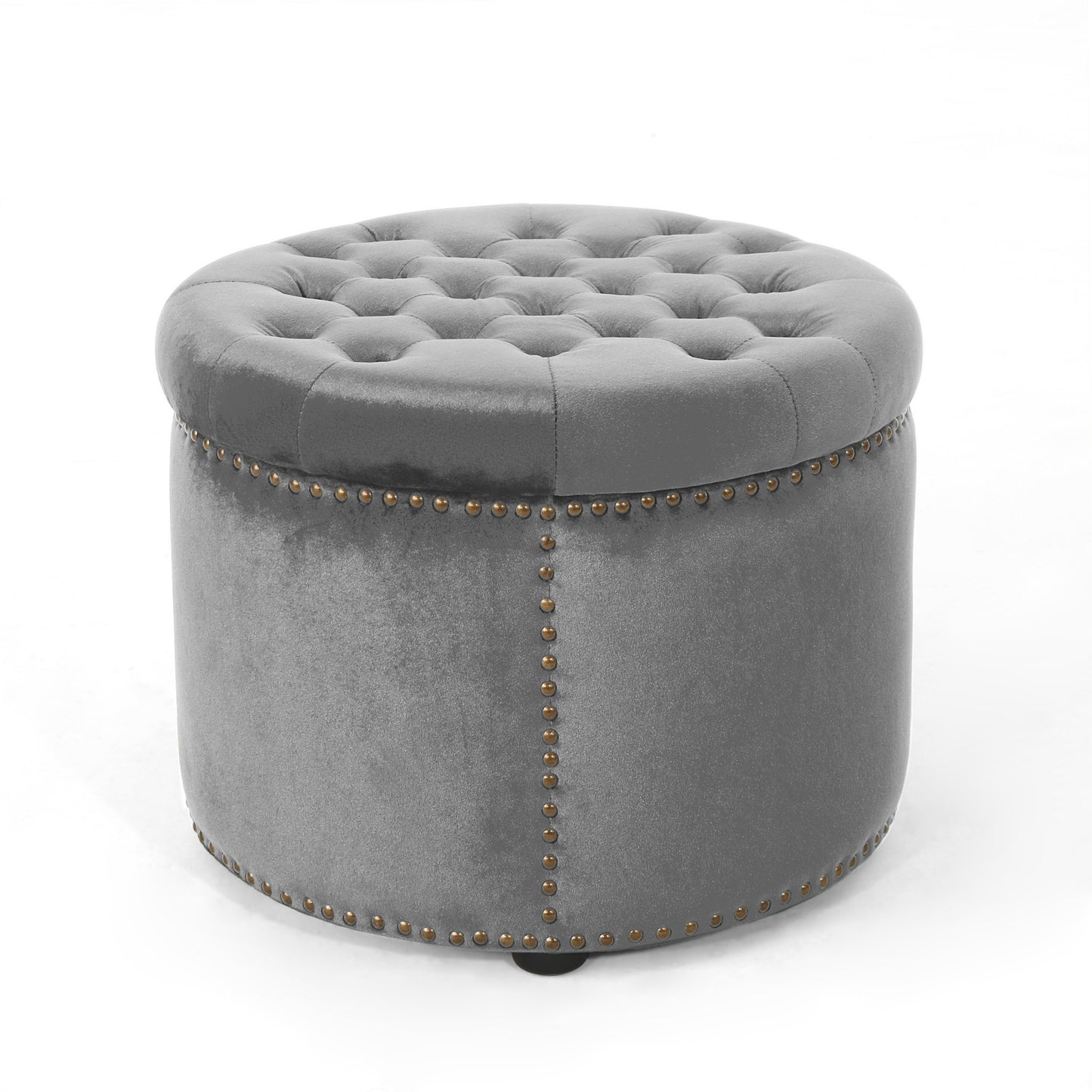 Grey velvet round ottoman with tufted top and nailhead trim accents perfect for living rooms