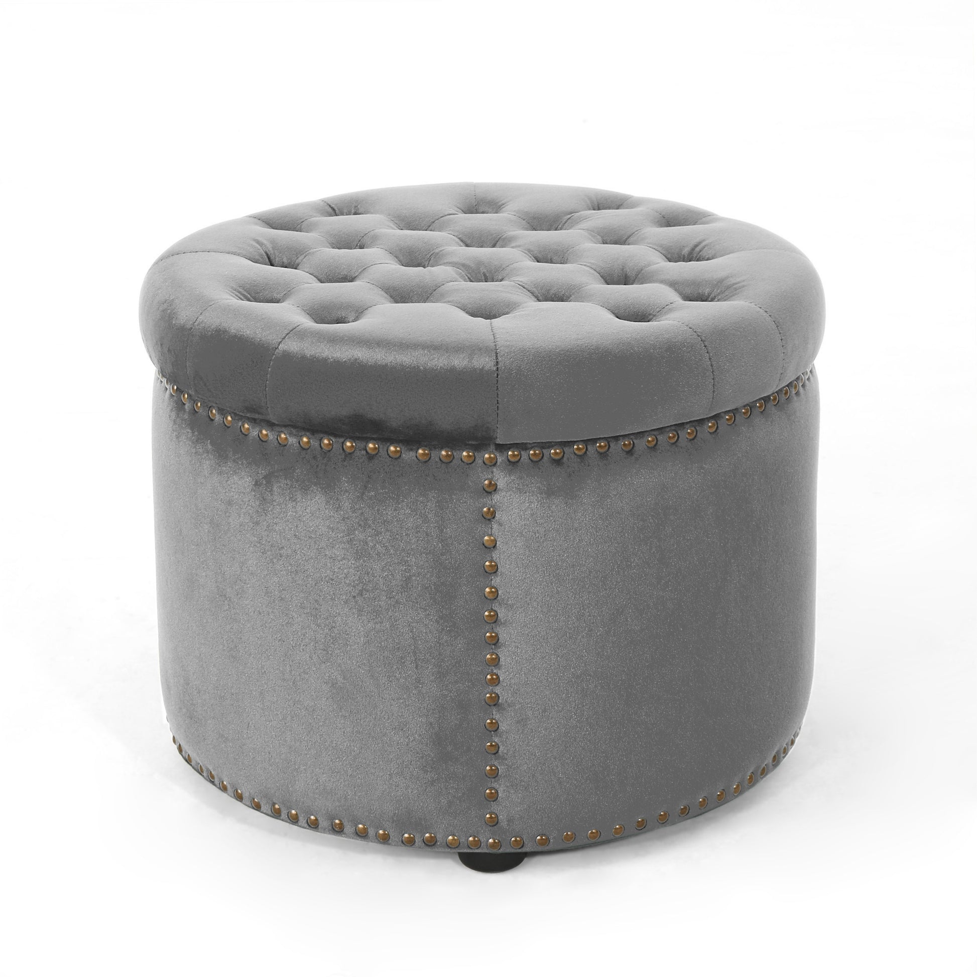 Grey velvet round ottoman with tufted top and nailhead trim accents perfect for living rooms