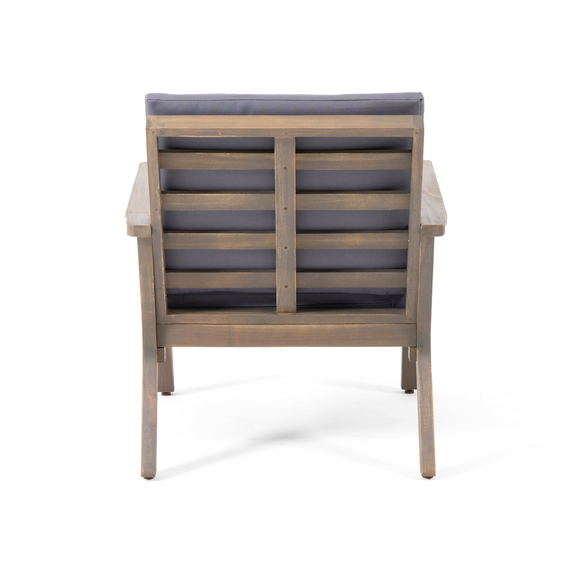 Back view of a grey wooden outdoor chair with plush cushions