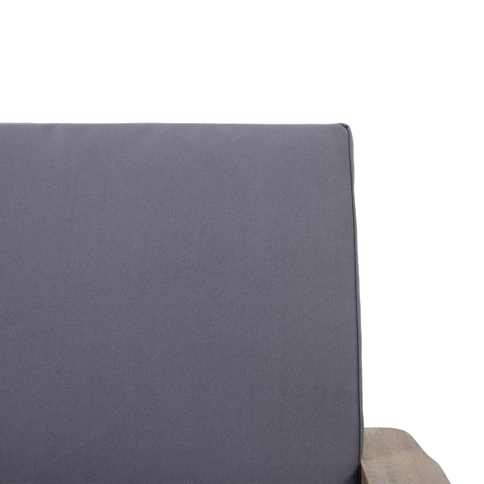 Closeup of a charcoal gray textured cushion fabric on a modern outdoor chair