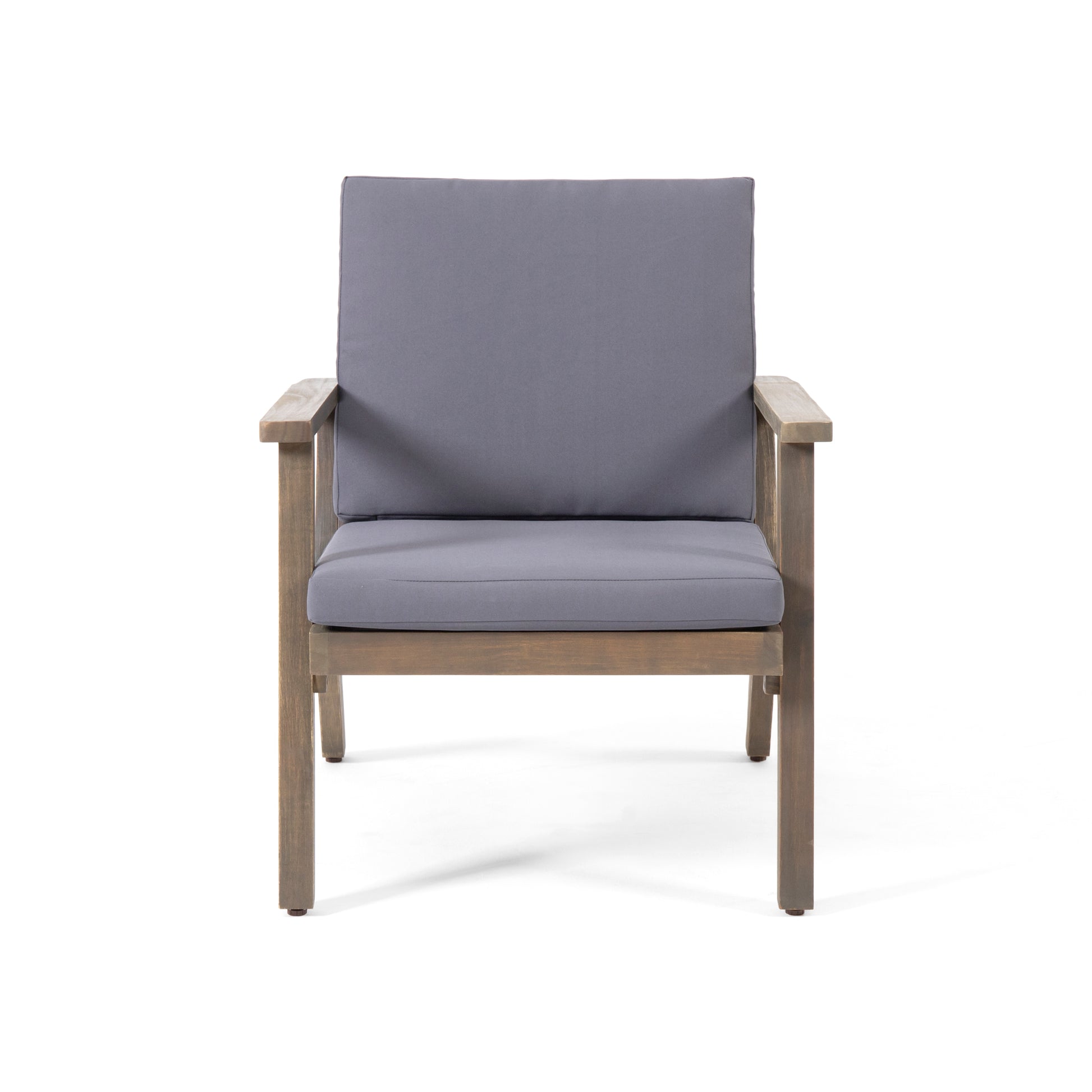 Weathered grey wood outdoor chair with plush charcoal cushions