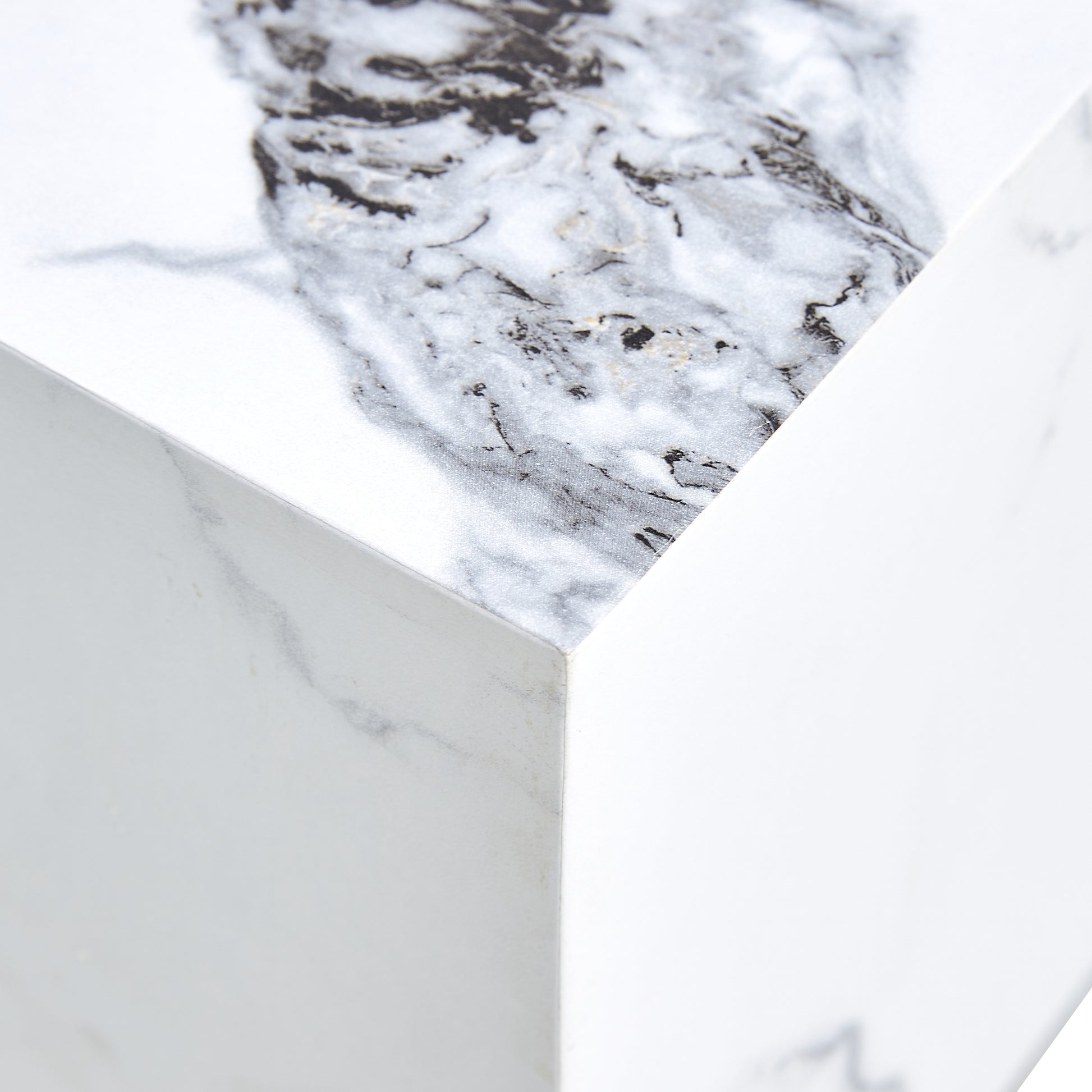 Close up of white marble surface with grey veining on a modern side table