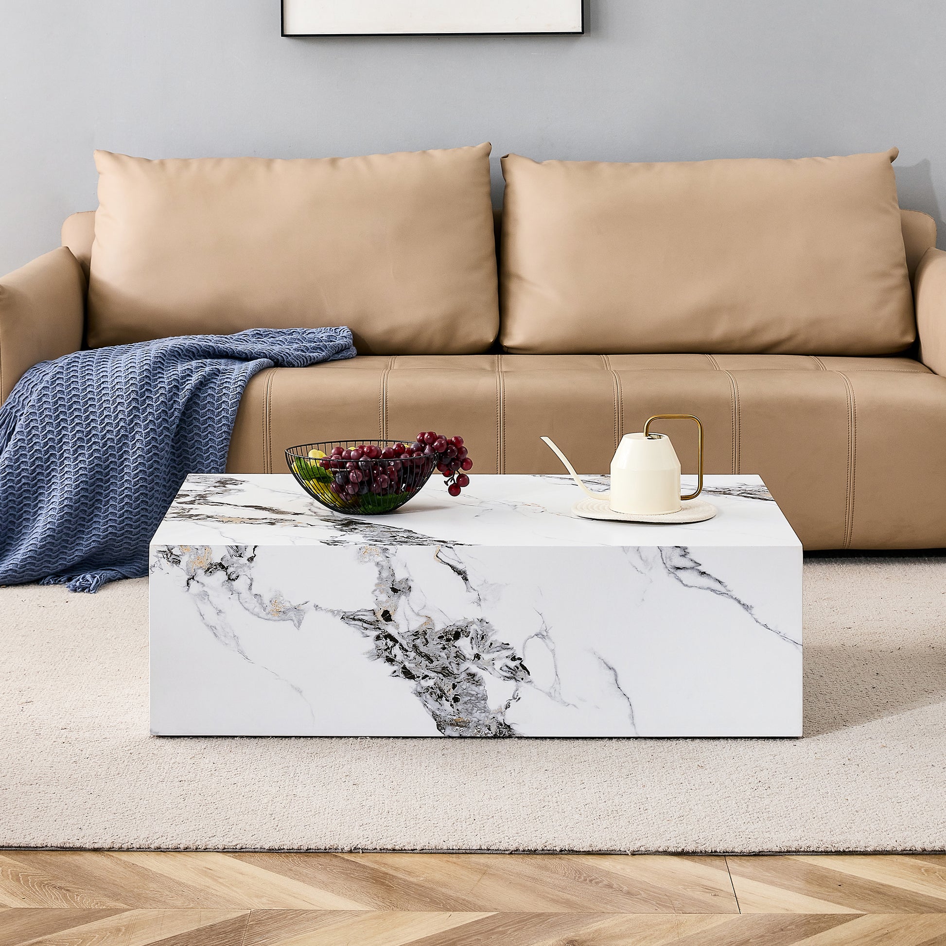 Modern marble coffee table with striking black and gold veining perfect for living rooms