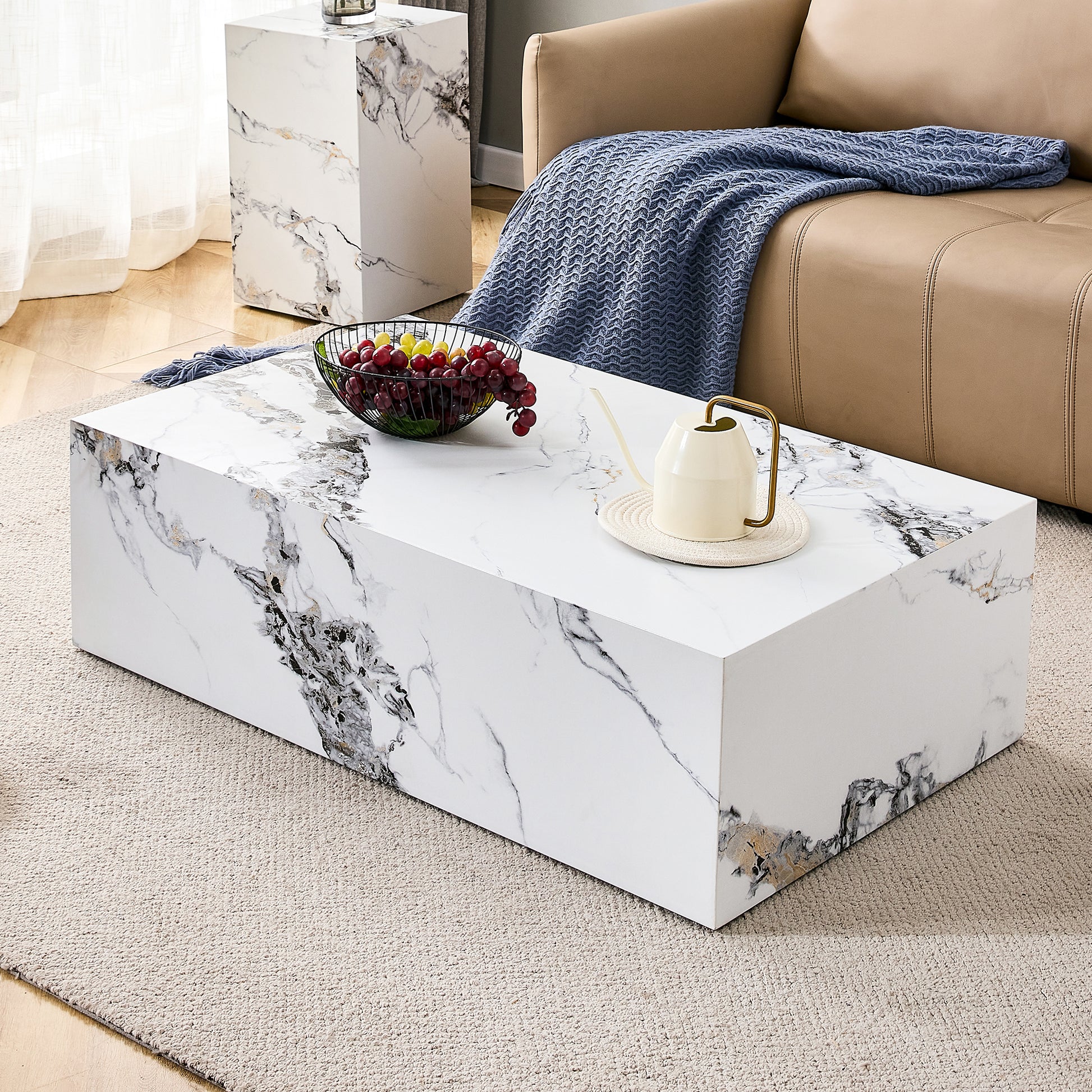 Modern rectangular marble coffee table with black and gold veining