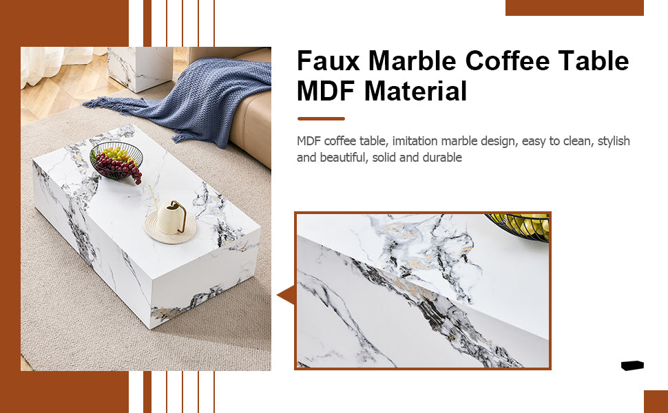 Rectangular faux marble coffee table with white and black veining on beige rug