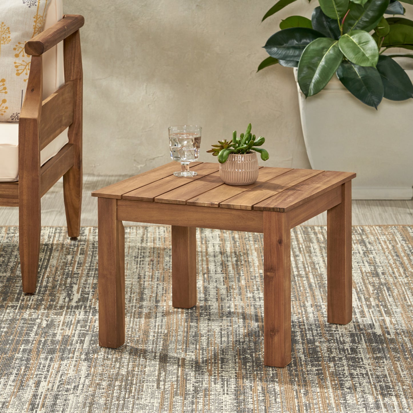 Solid wood patio side table with slatted top and square legs perfect for outdoor seating