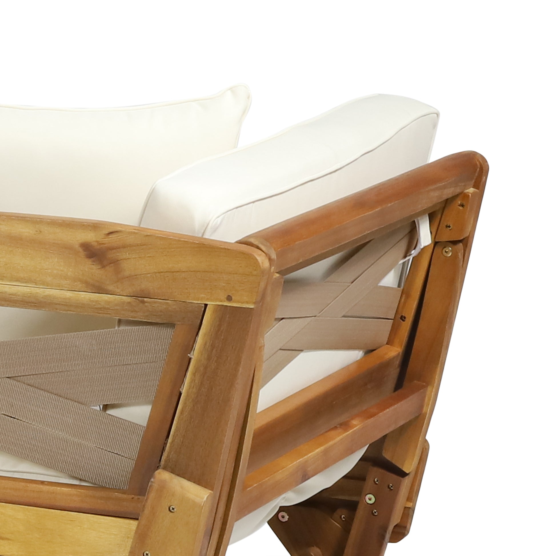 Detail of a wooden armchair with cream cushions and woven straps