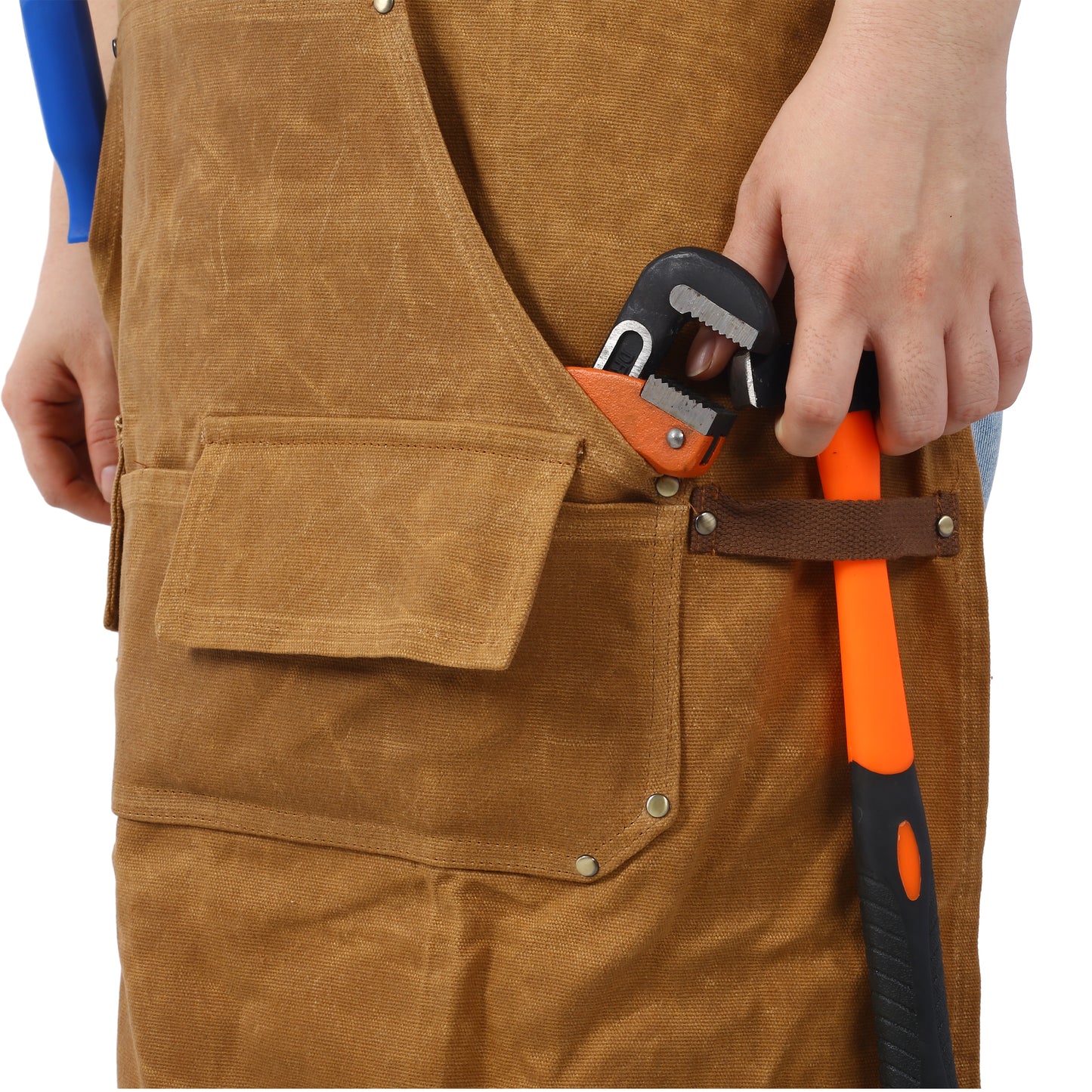 Brown canvas work apron with orangehandled adjustable wrench in pocket