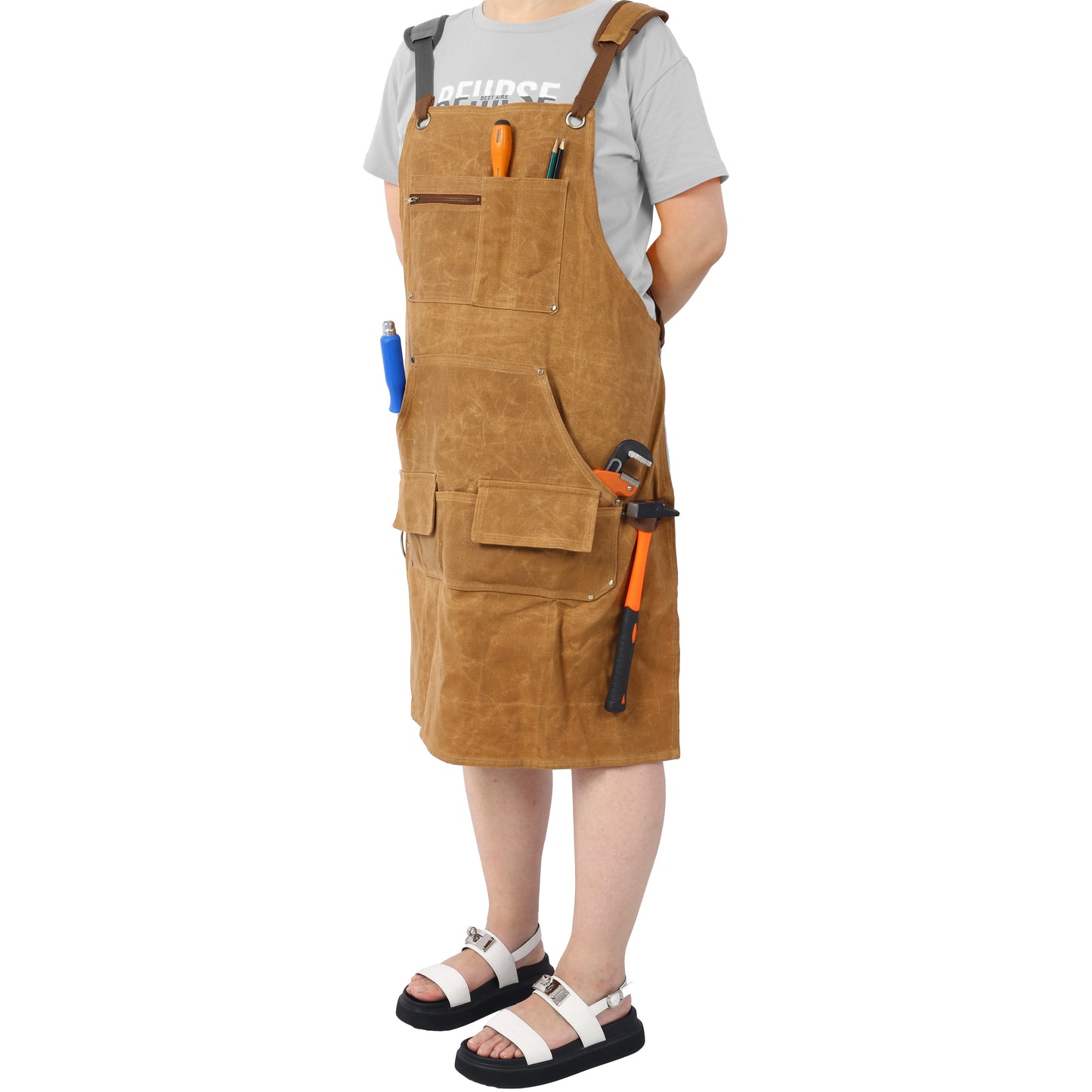 Brown canvas utility apron with multiple pockets and tools ideal for DIY projects