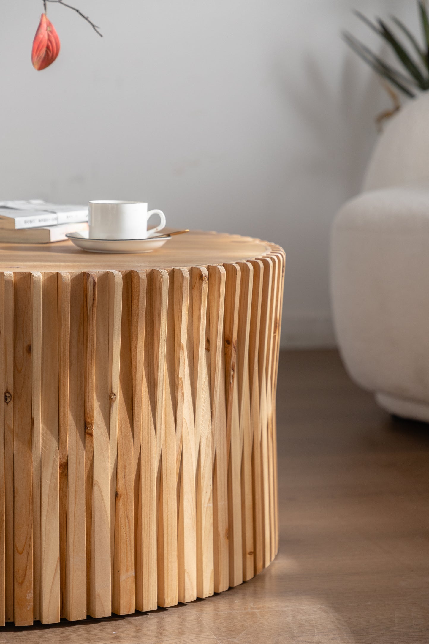 Natural wood coffee table with fluted design perfect for modern living rooms
