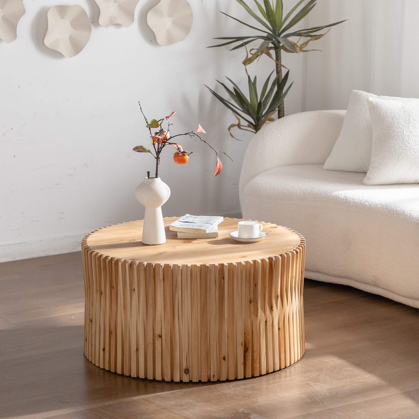 Round wooden coffee table with vertical slats natural finish modern design