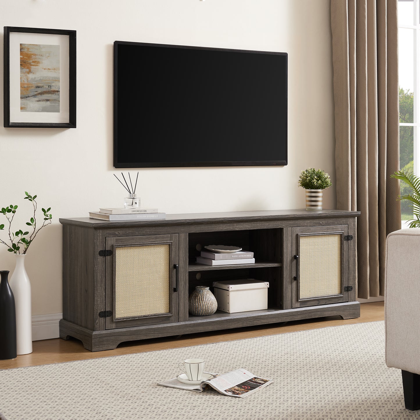 Rustic gray wood TV stand with woven cane doors and black hardware