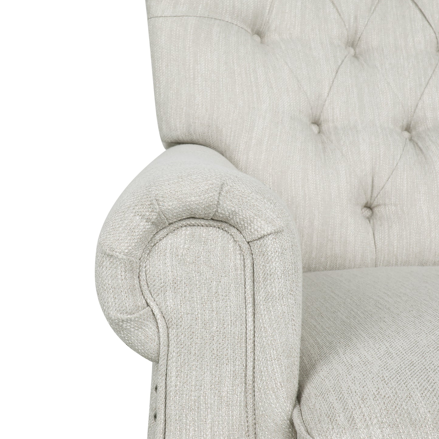Closeup of a tufted linen armchair armrest in light beige fabric