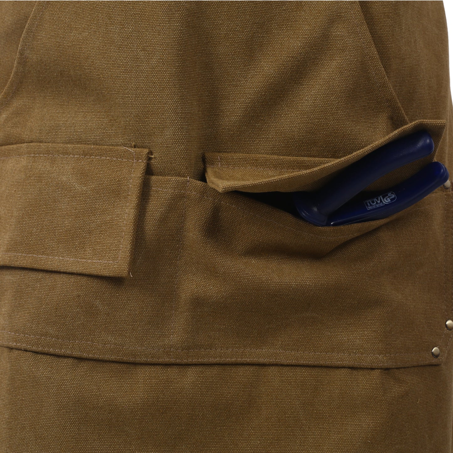 Brown canvas work apron pocket with blue tool