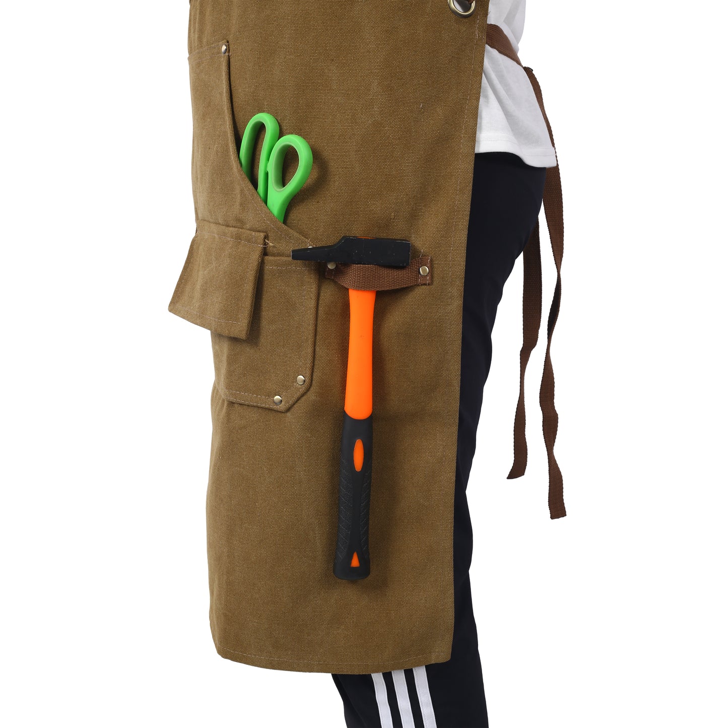 Brown canvas work apron with hammer and green scissors in pockets
