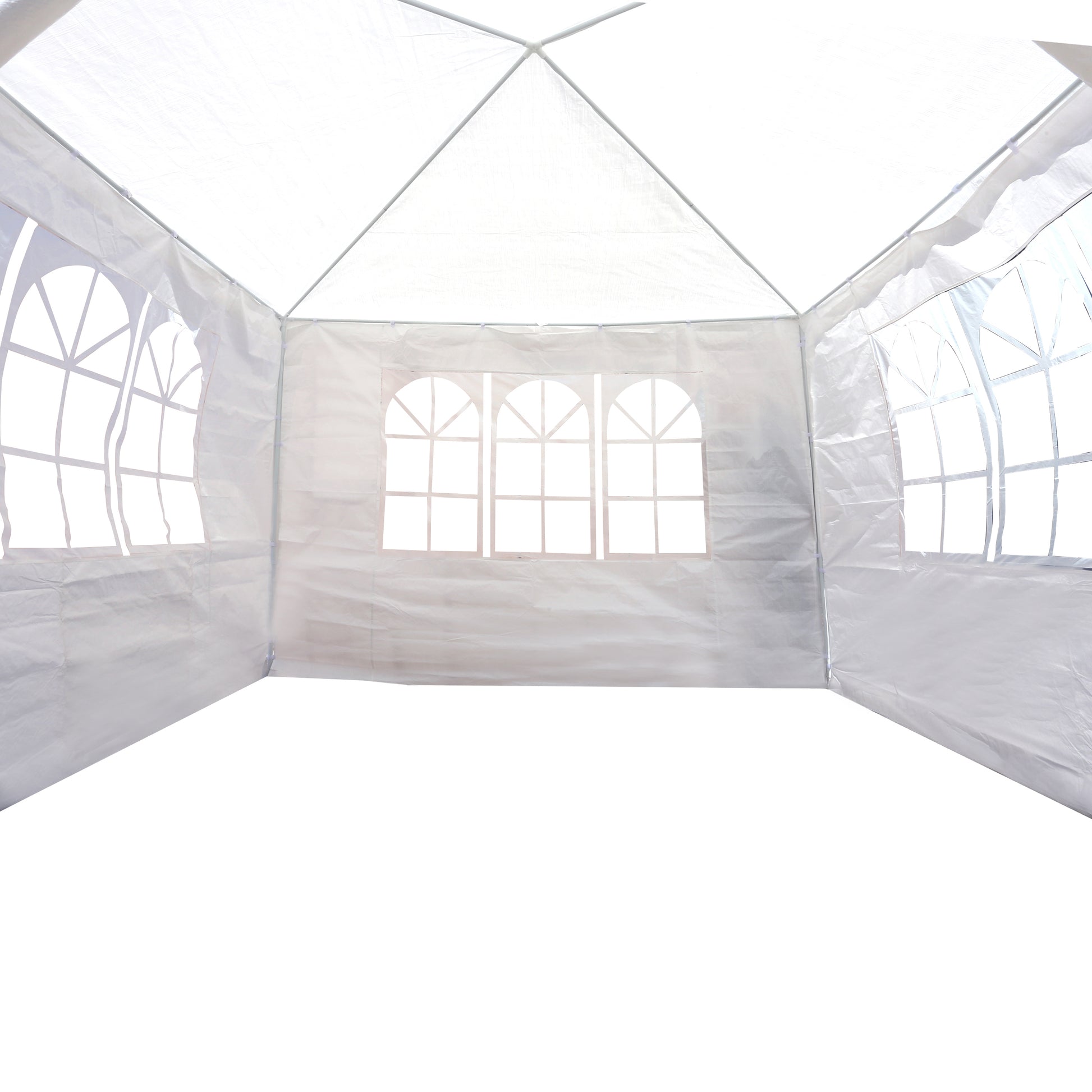 Interior view of a white party tent with arched windows and a peaked roof structure