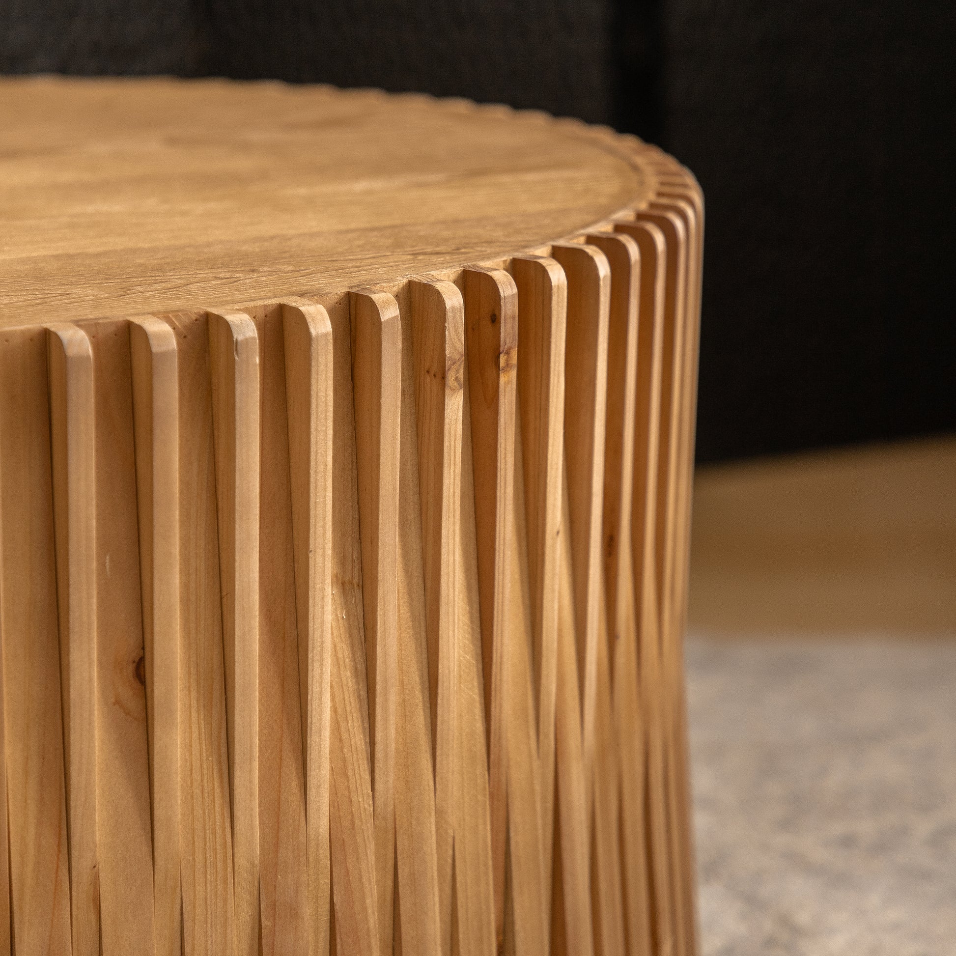 Natural wood coffee table with fluted side detail