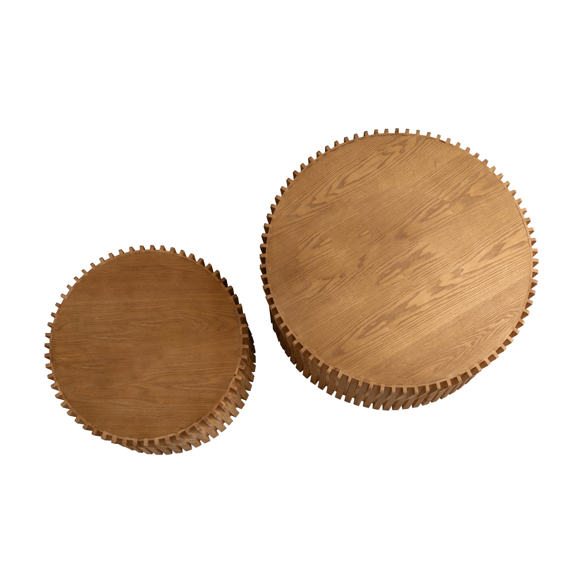 Two round wooden coffee tables with carved edges and a natural wood grain