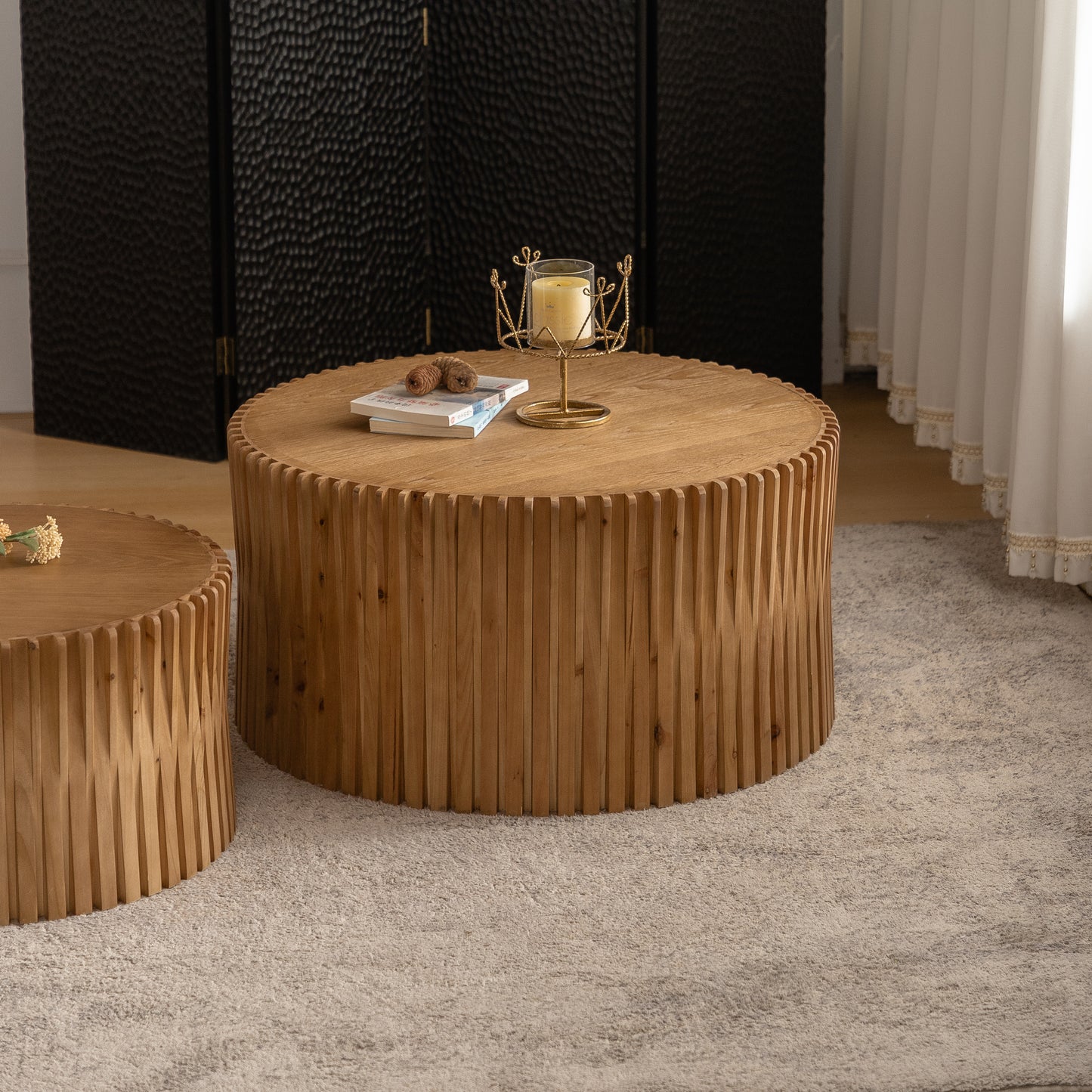 Round wooden coffee table with ribbed texture perfect for modern living rooms