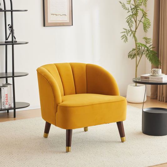 Mustard yellow velvet accent chair with channel tufting and tapered wooden legs