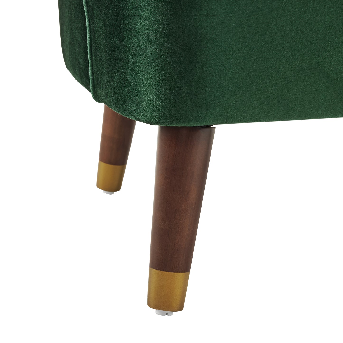 Deep green velvet armchair legs with gold accents and wooden finish