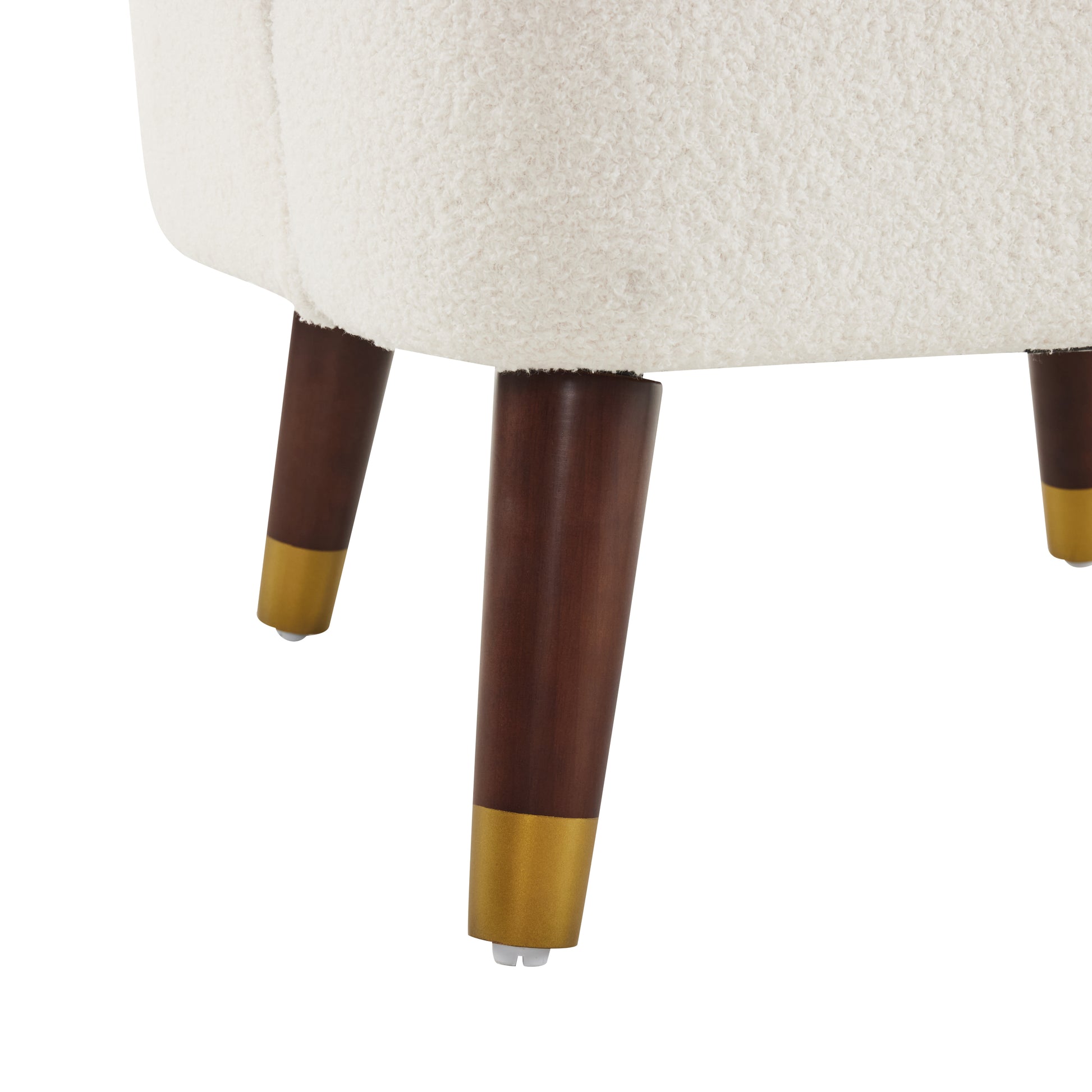 Cream boucle armchair with angled wood legs and gold accents modern living room accent
