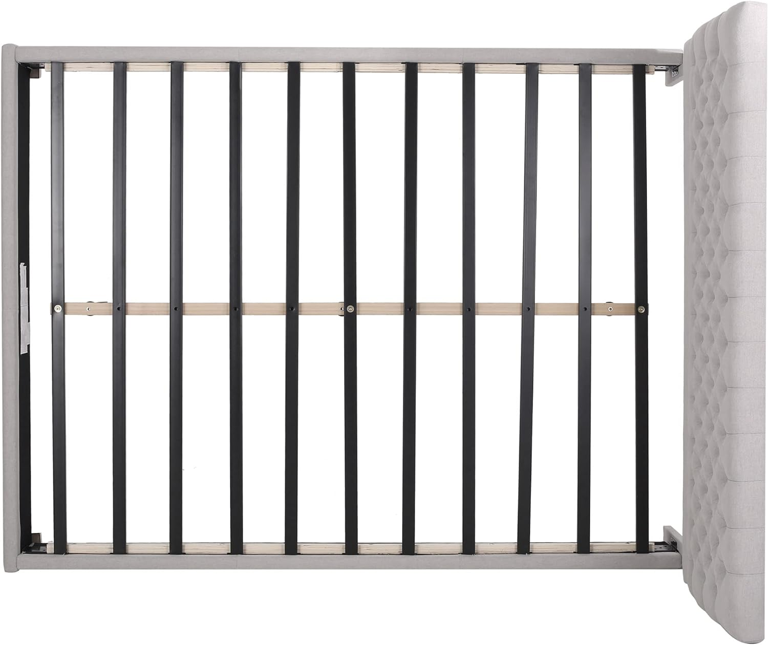 Gray upholstered bed frame with metal slats for mattress support