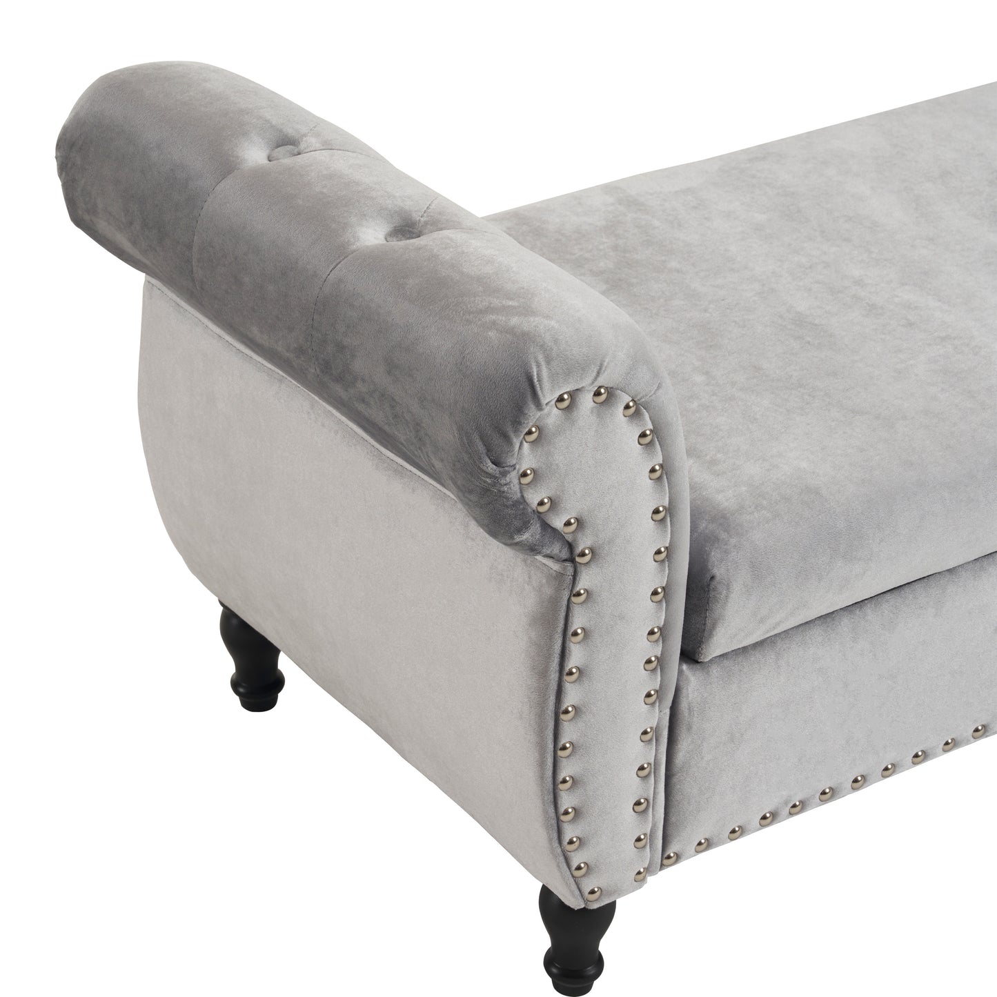 Grey velvet bench with button tufting and silver nailhead trim detail