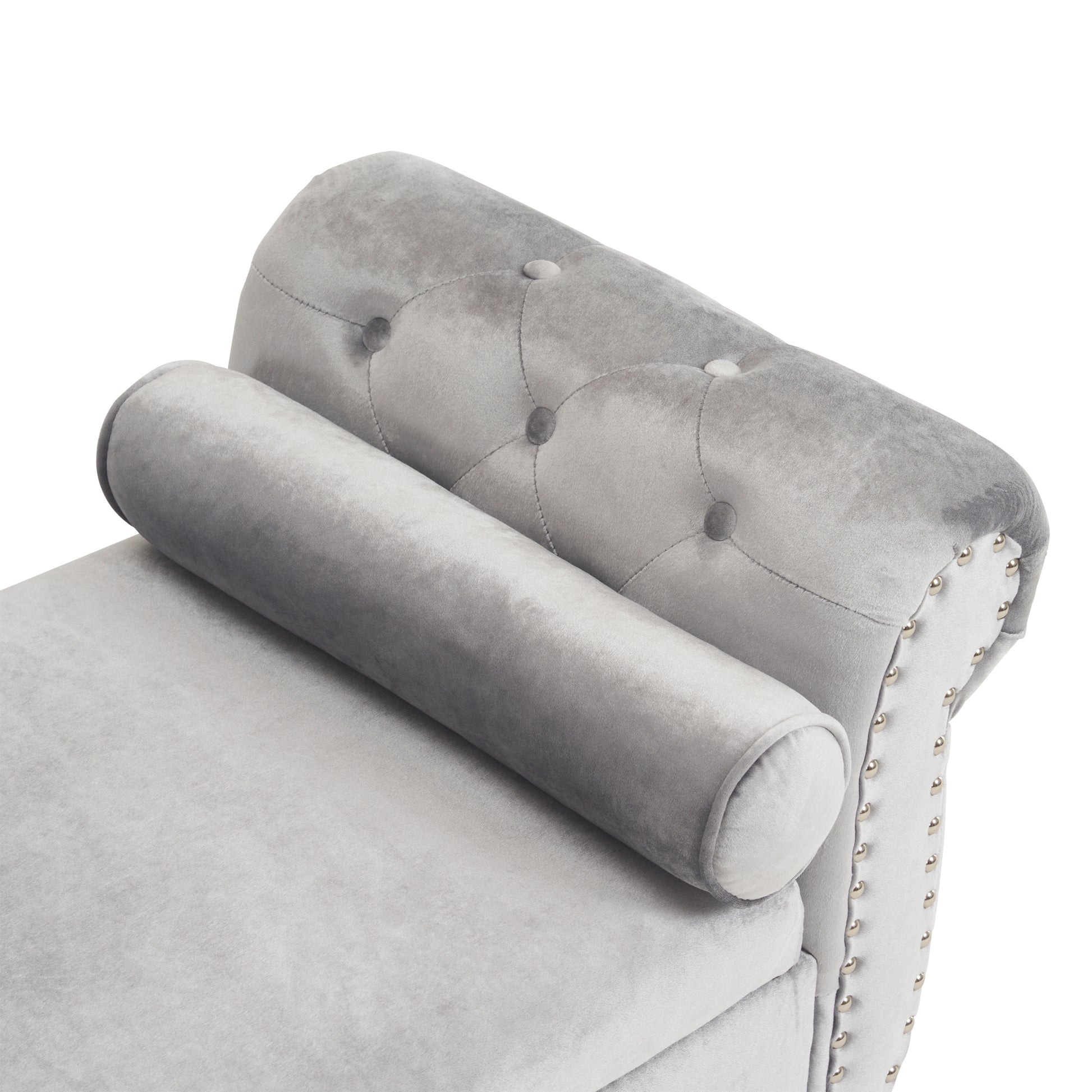 Plush grey velvet tufted bench with rolled armrest and silver nailhead trim