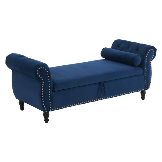 Deep blue velvet storage bench with tufted back silver nailhead trim and bolster pillow