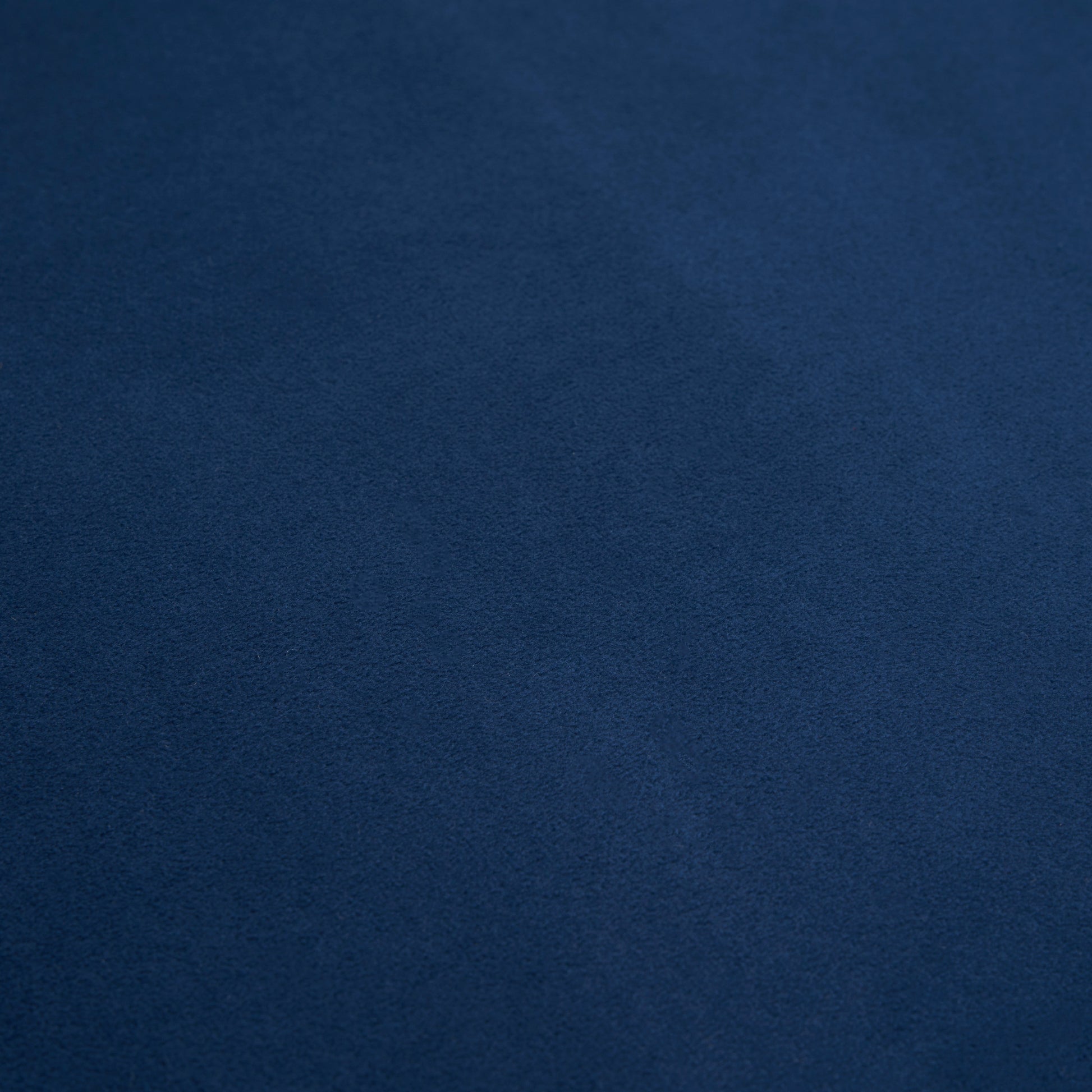 Textured navy blue fabric swatch with a subtle flecked surface