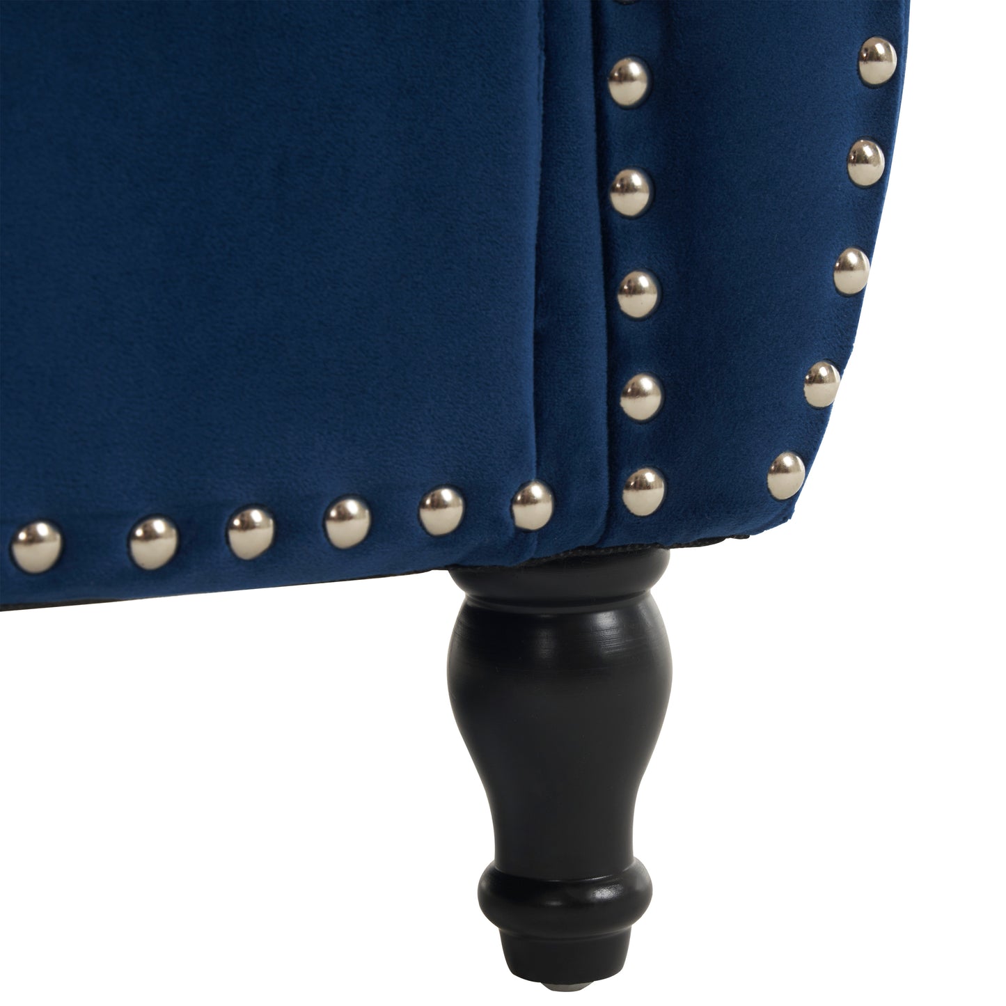 Deep blue velvet armchair with silver nailhead trim detailing