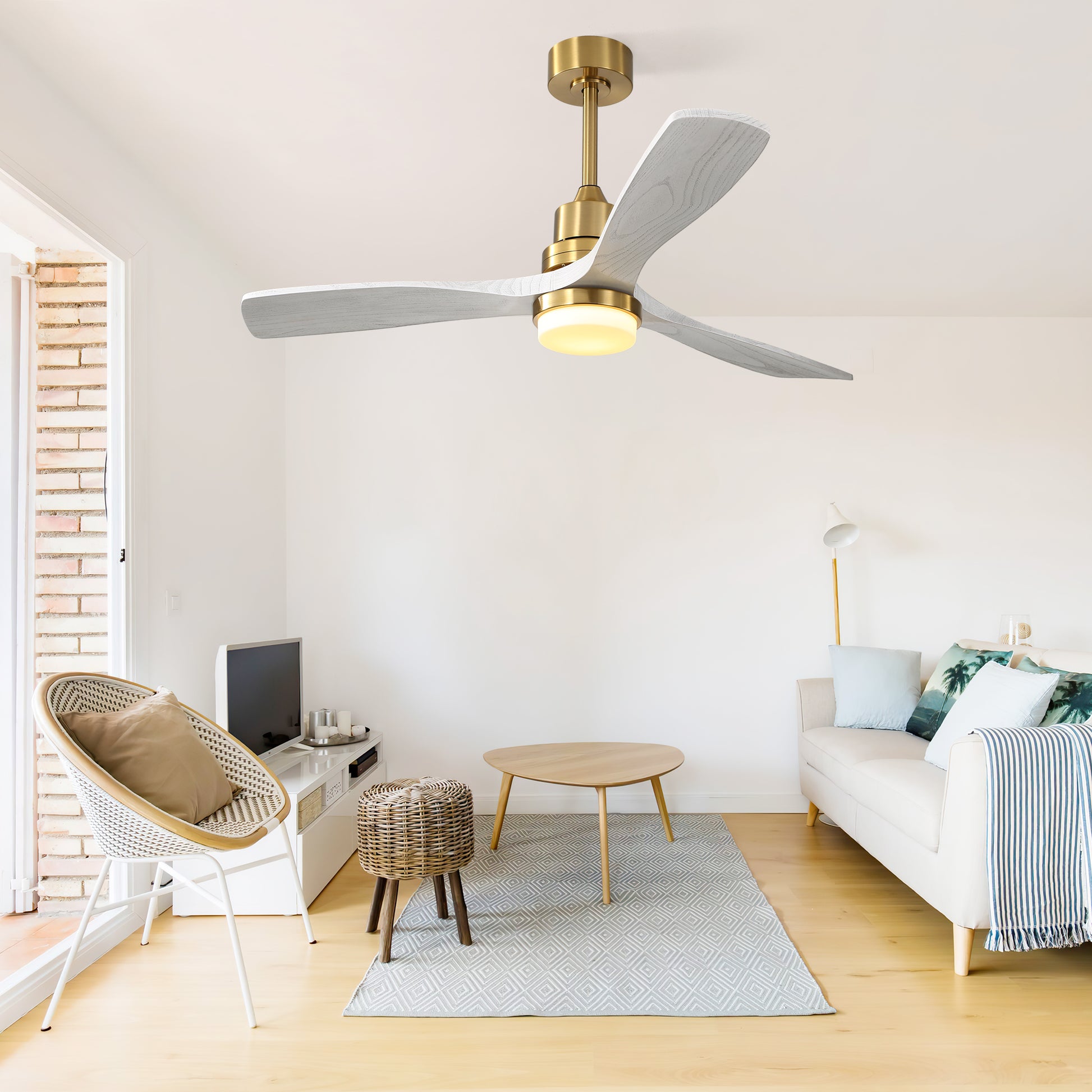 Modern brass and white wood ceiling fan with integrated LED light