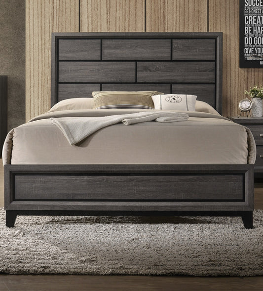 Modern grey wood panel headboard on a queensize bed with plush bedding