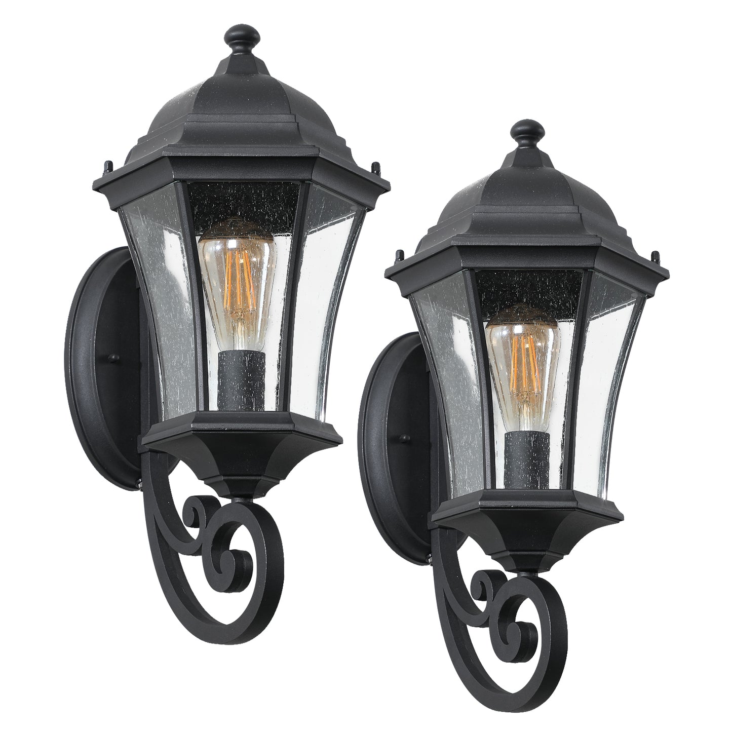 Pair of black wrought iron wall lanterns with seeded glass and vintage Edison bulbs