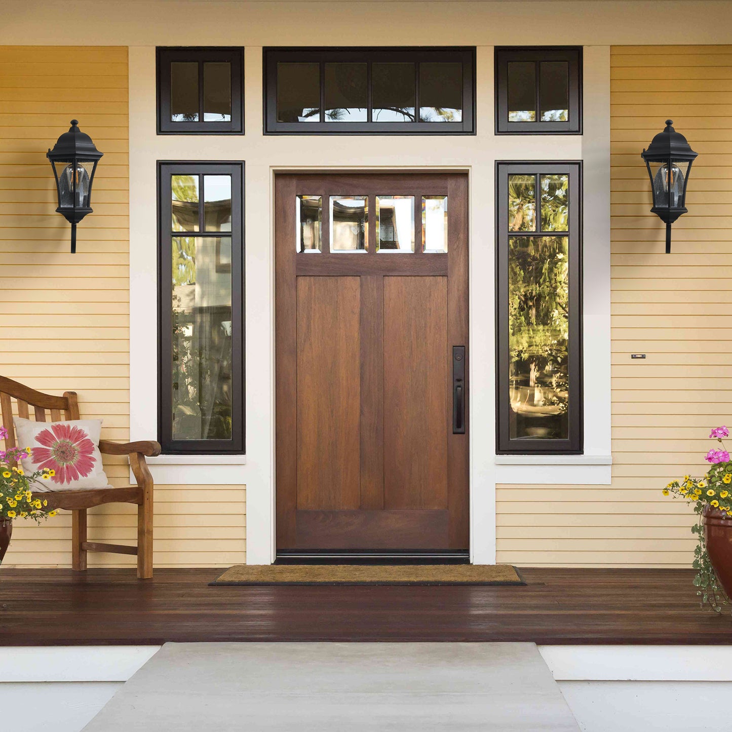 Black metal lantern outdoor porch light with seeded glass mounts to exterior walls
