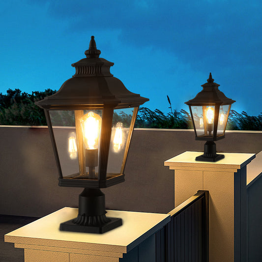 Classic black outdoor post light with clear glass panels and Edison bulb
