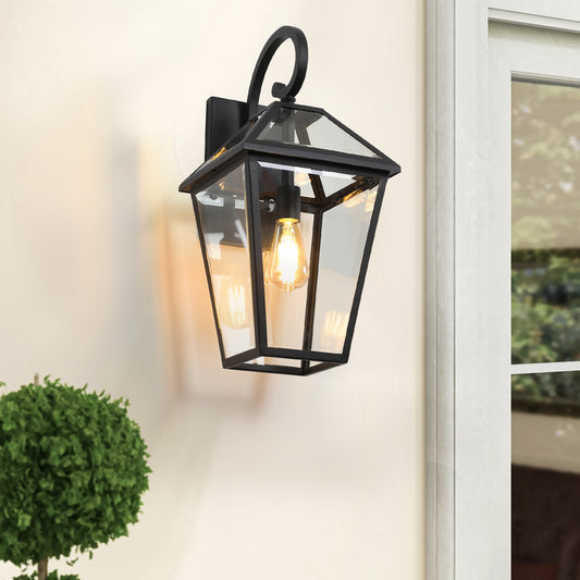 Classic black outdoor lantern with clear glass panels and visible Edison bulbs