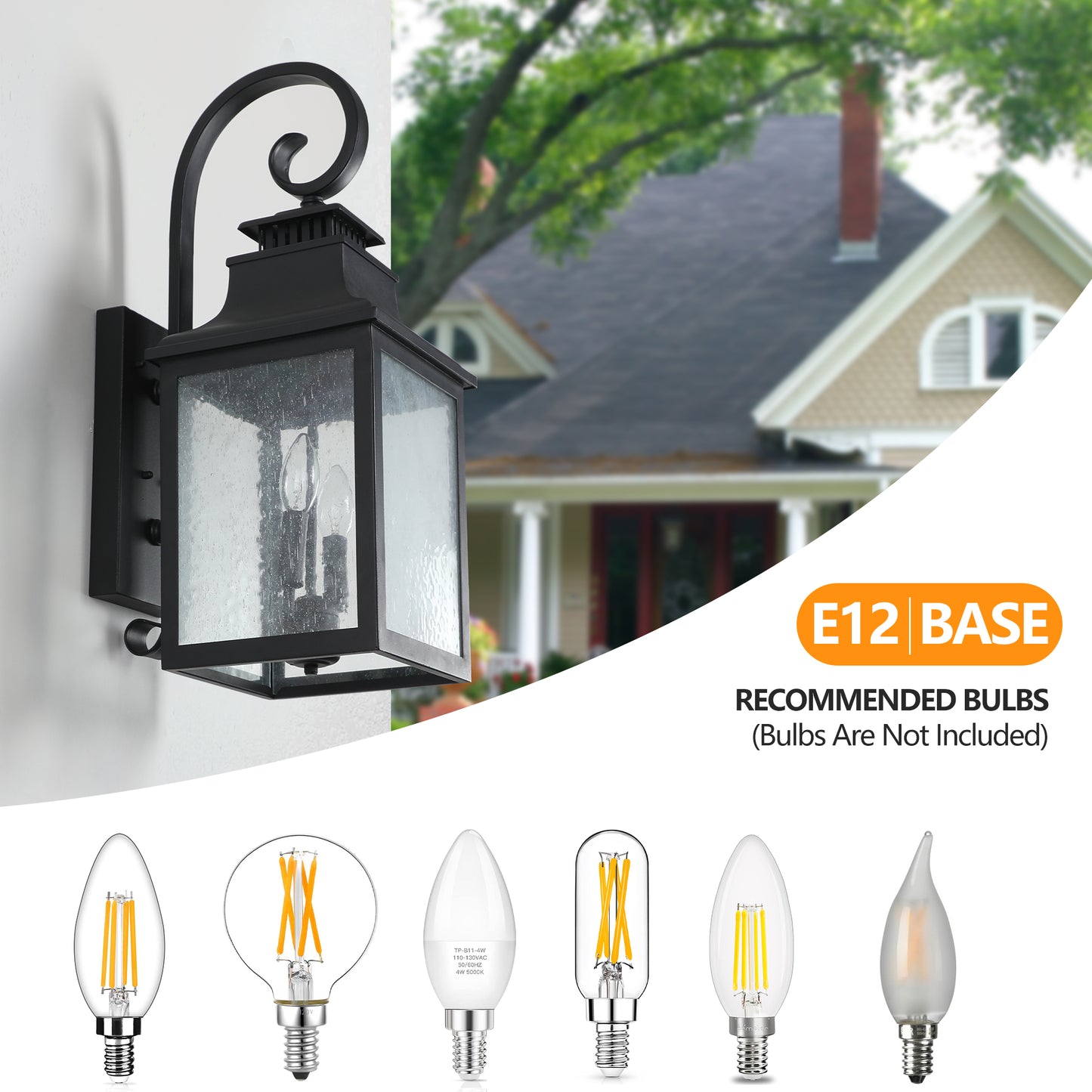 Black outdoor wall lantern with seeded glass and ornate scroll detail