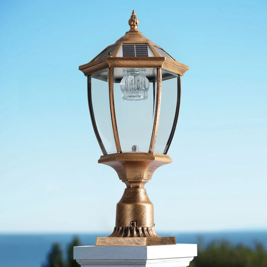 Antique brass solar post lamp with clear glass lantern and octagonal top