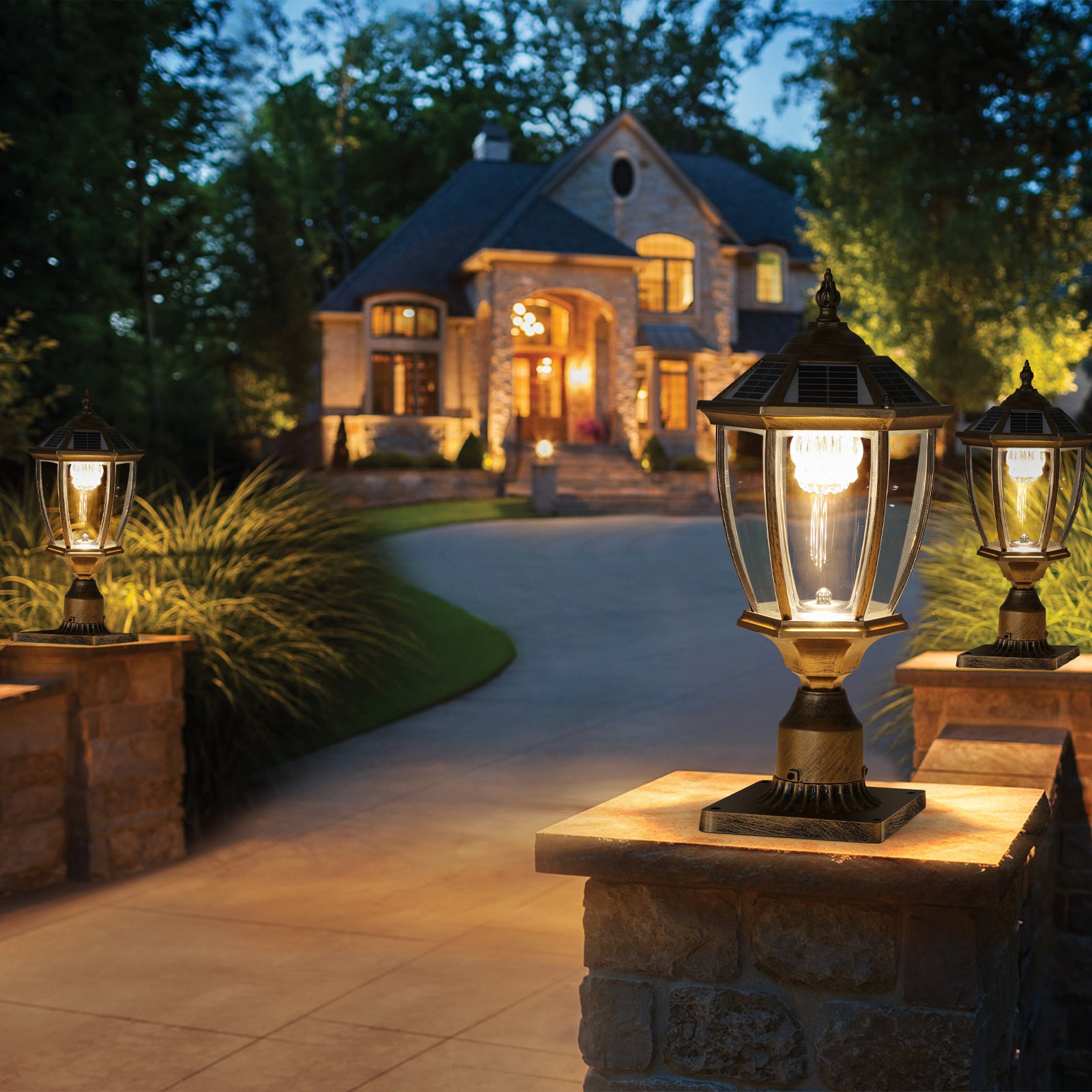 Elegant bronze solar post light with clear glass panels illuminating a driveway