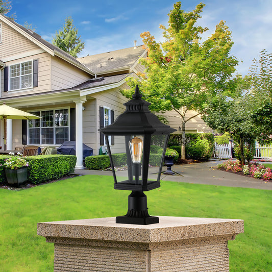 Black traditional post lantern with clear glass panels and an Edison bulb