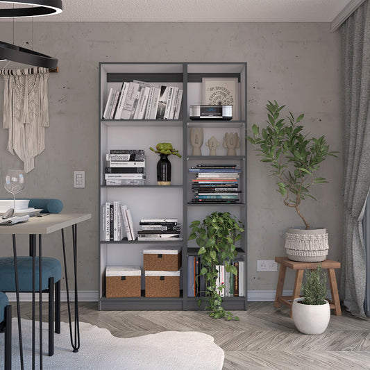 Modern grey bookcase with various books and decorative items