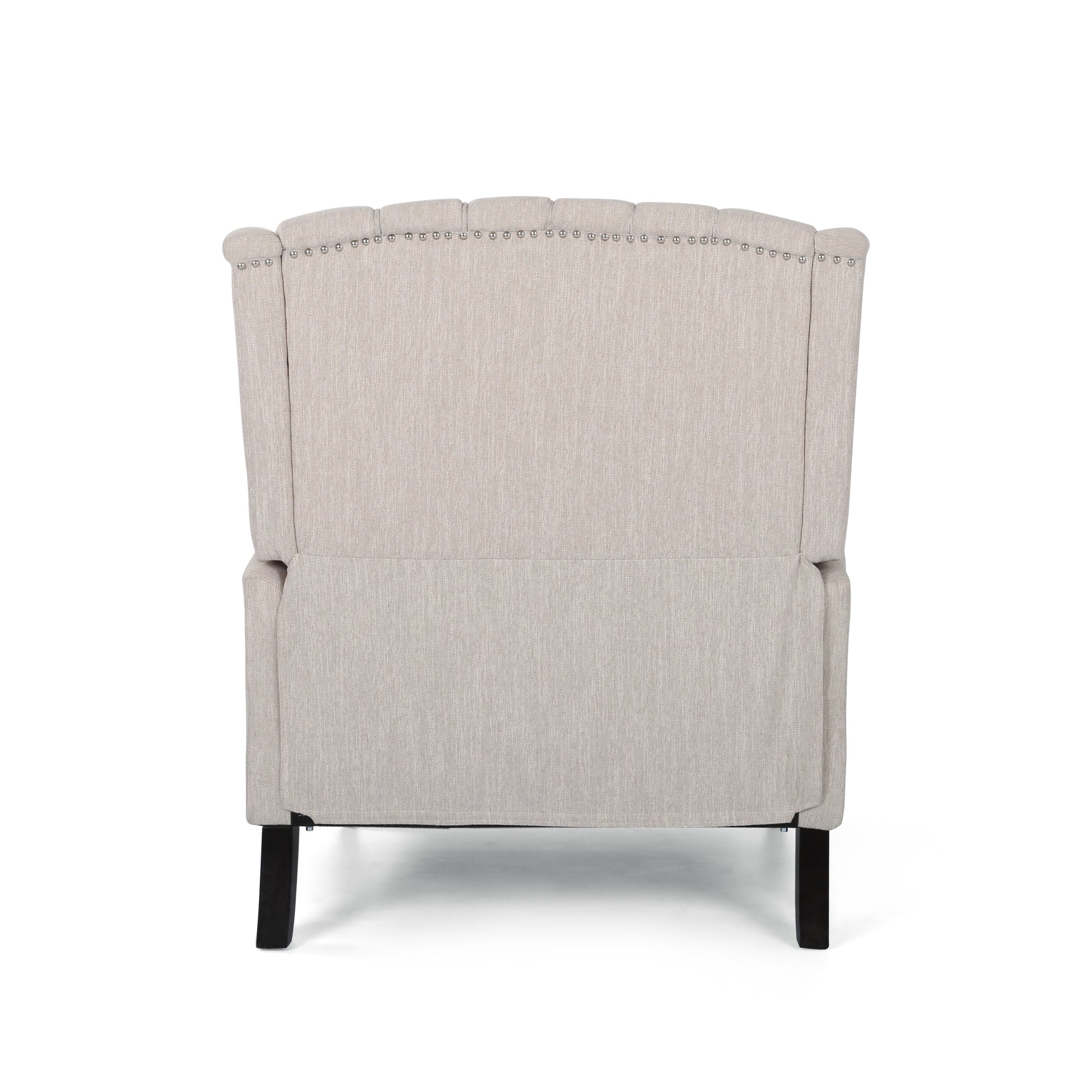Beige upholstered wingback accent chair with nailhead trim detail