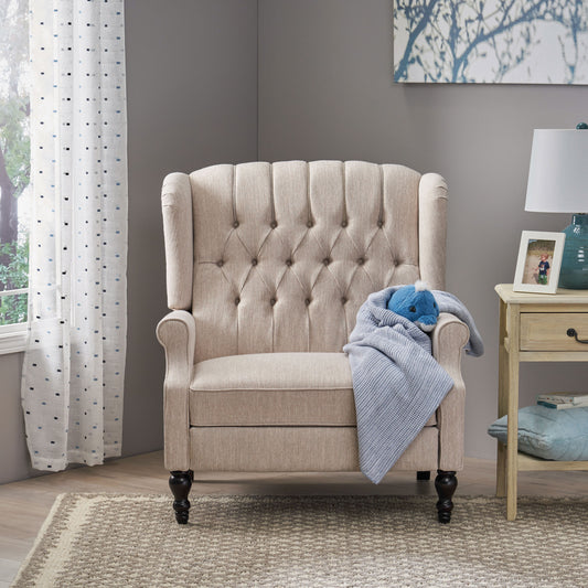 Tufted beige wingback accent chair with wooden legs and blue throw