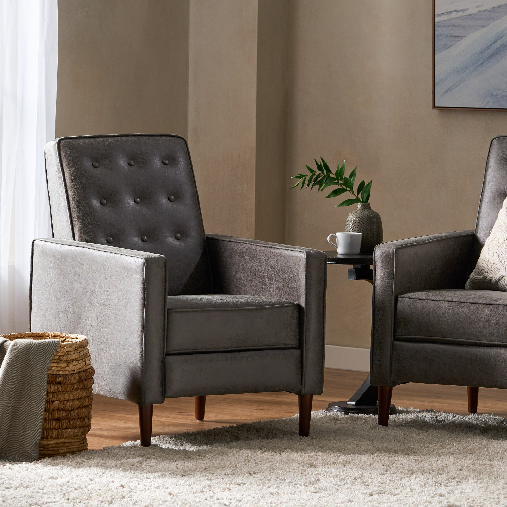 Tufted gray faux leather accent chair with tapered wooden legs perfect for living rooms