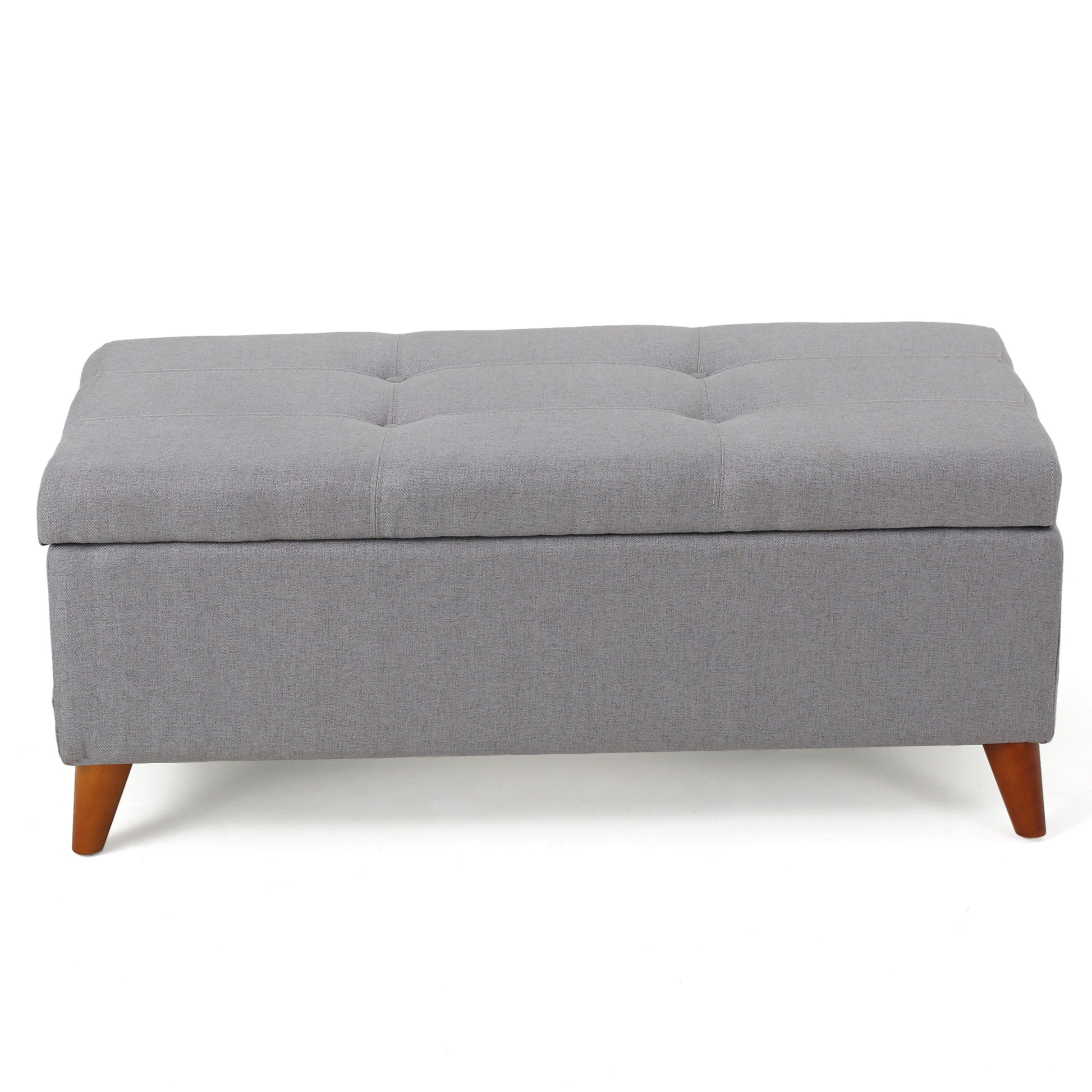 Grey fabric storage ottoman with tufted top and tapered wooden legs